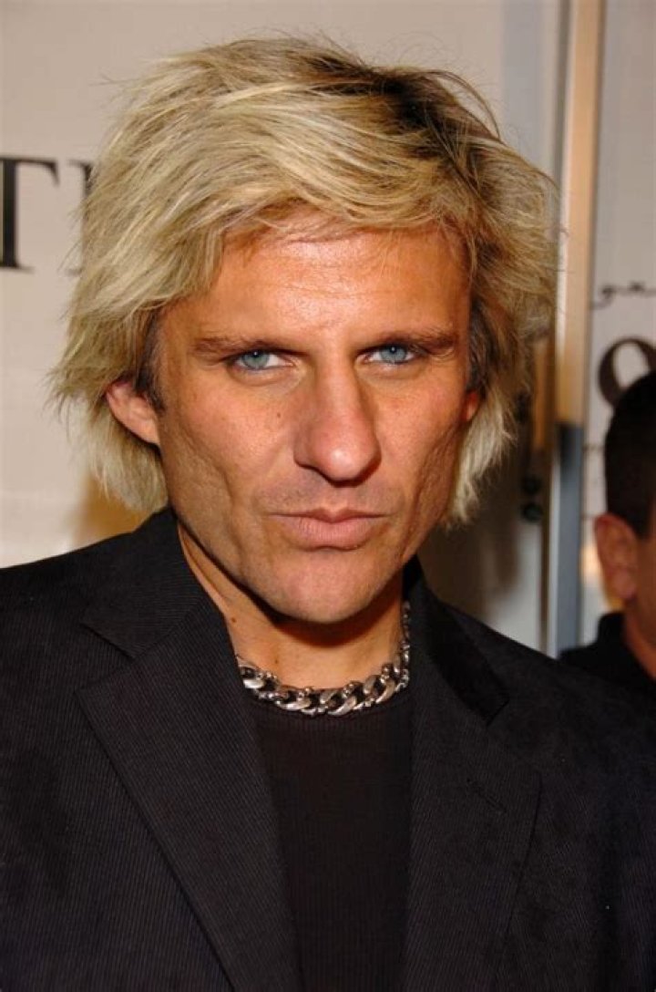 C.C. DeVille's Age: How Old Is The Guitarist?