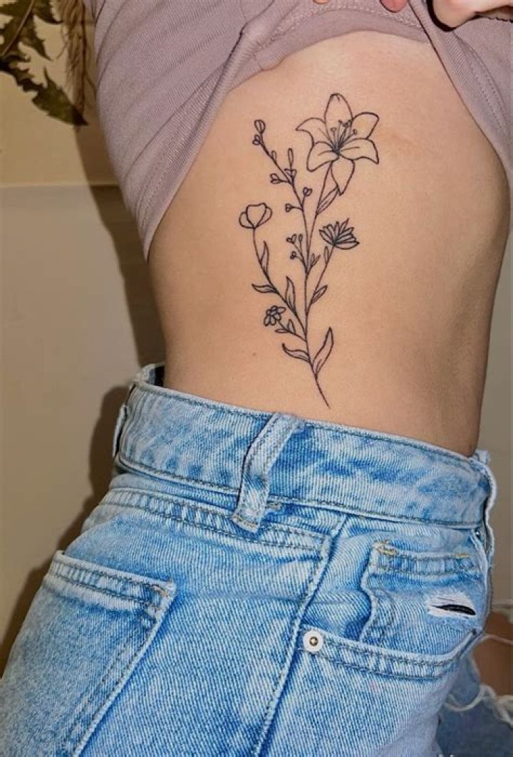 Enchanting Floral Rib Tattoos: A Symphony Of Delicate Designs