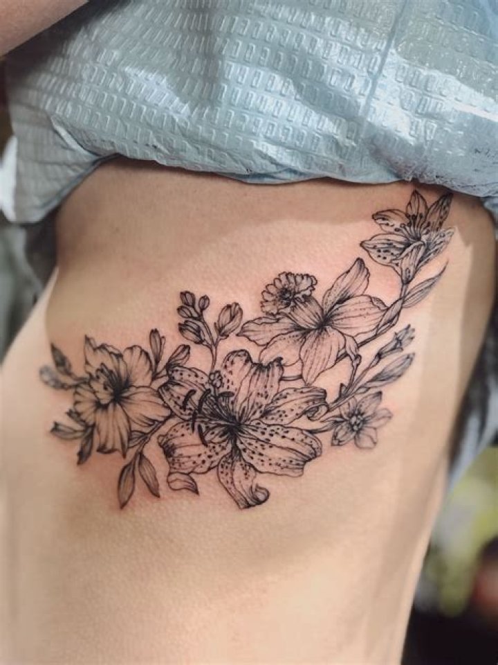 Rib-tastic Floral Tattoos: The Ultimate Guide To Flower Rib Art